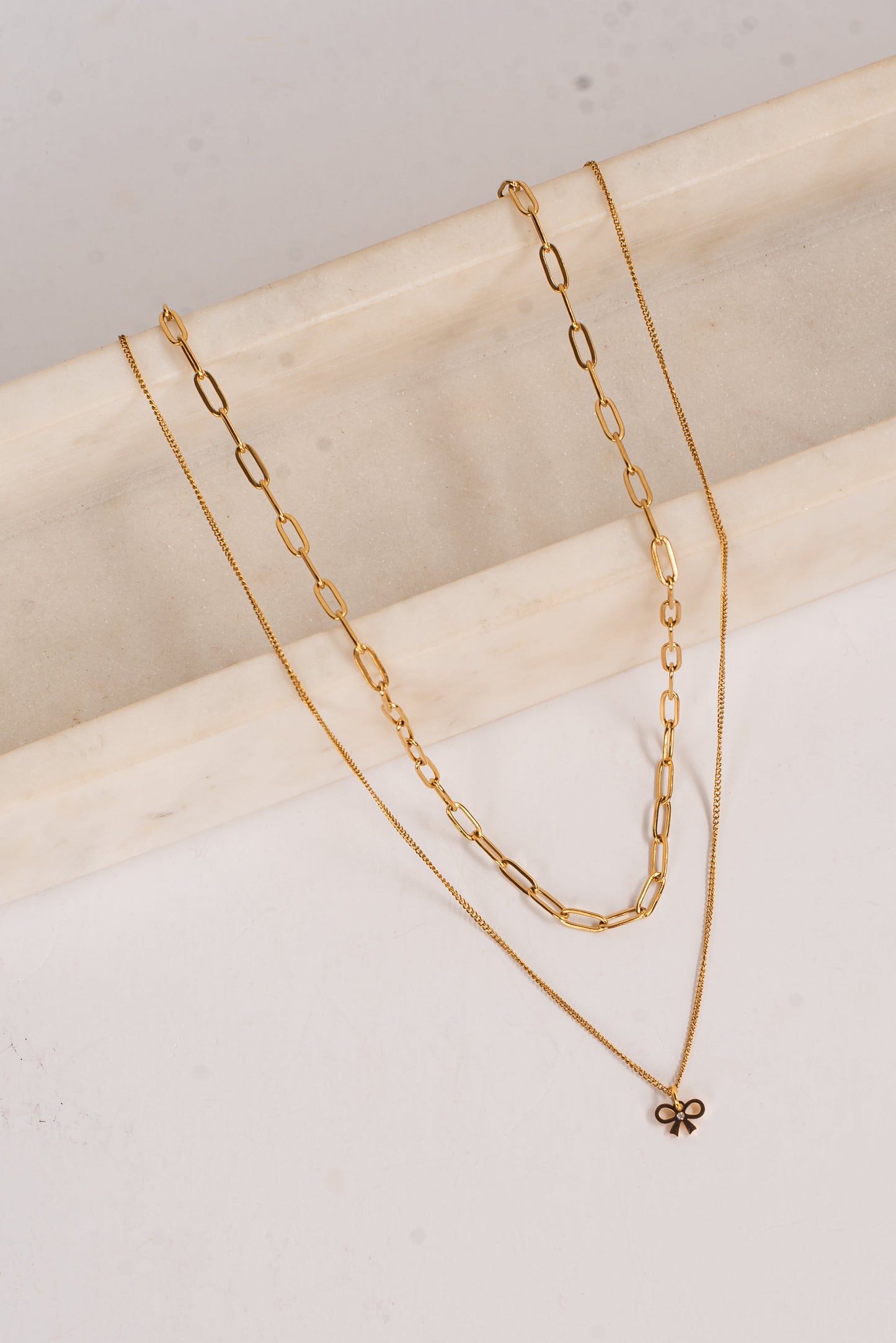 Jada Gold Layered Bow Charm Necklace