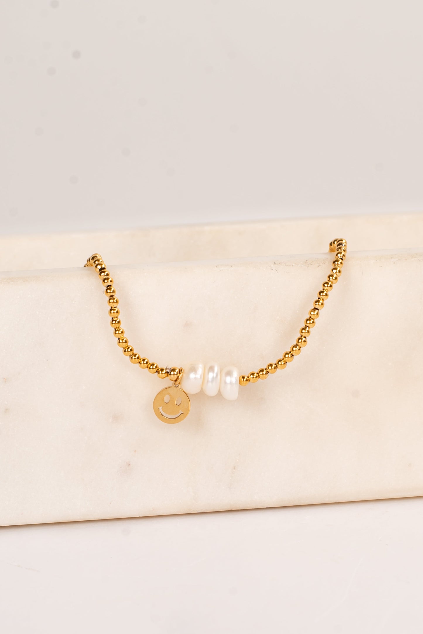 Ava Gold Beaded Pearl Smiley Face Charm Bracelet