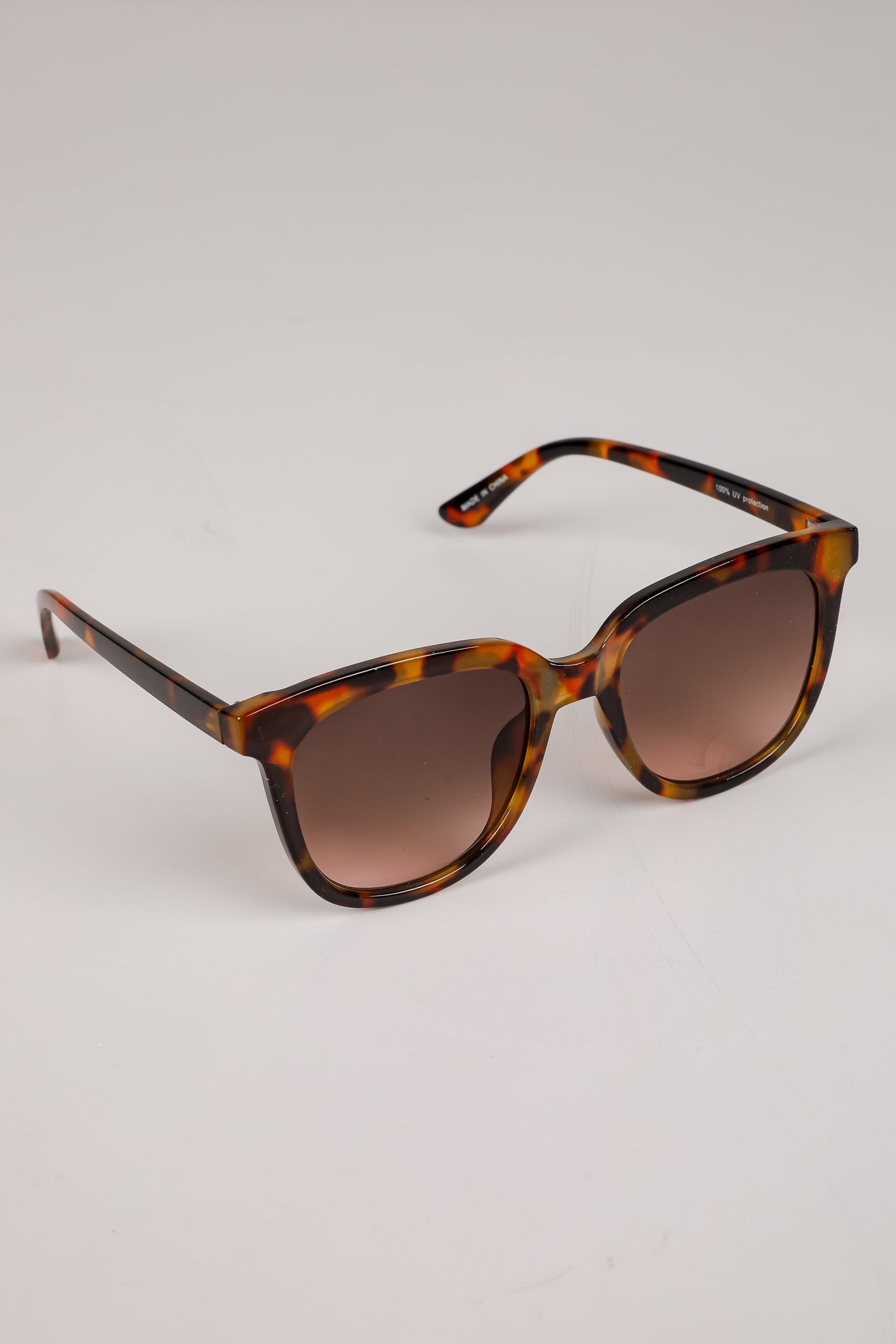 Glistening Lights Tortoise Round Sunglasses