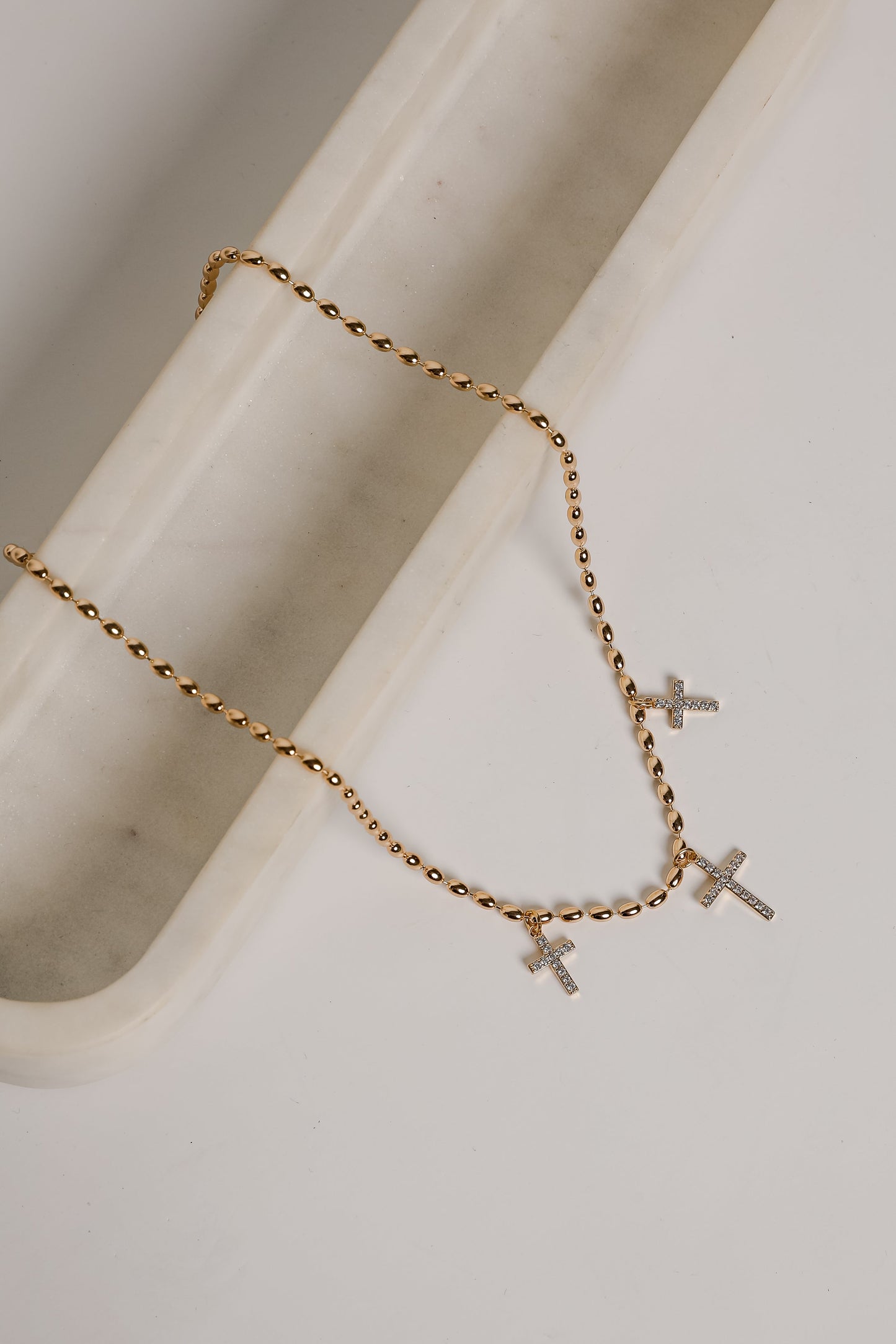 Naomi Gold Cross Charm Necklace