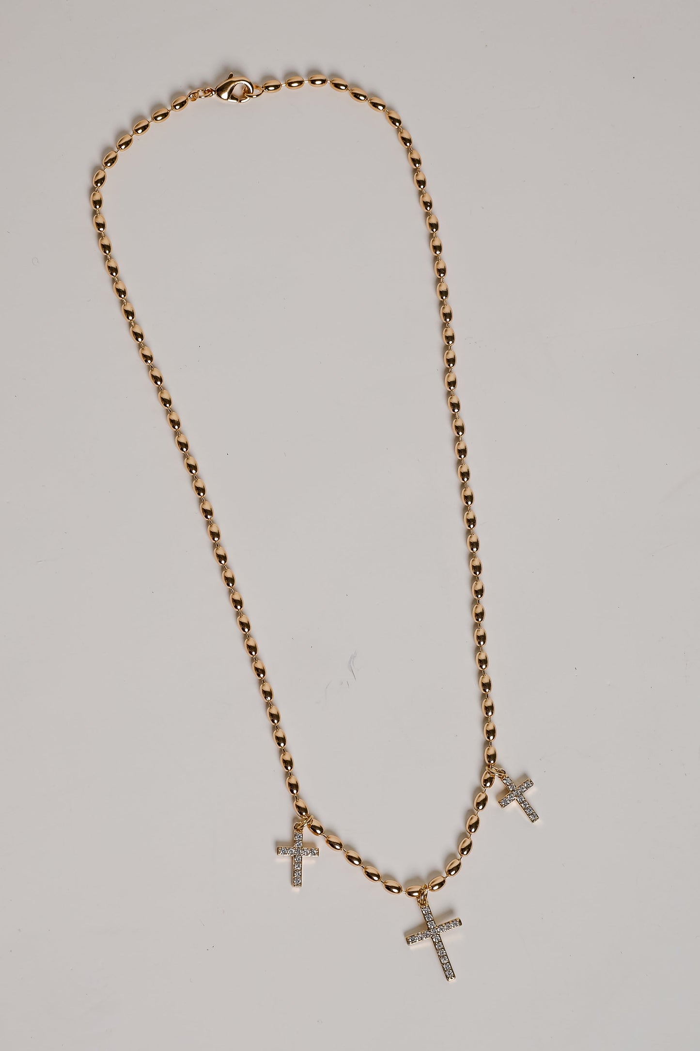 Naomi Gold Cross Charm Necklace