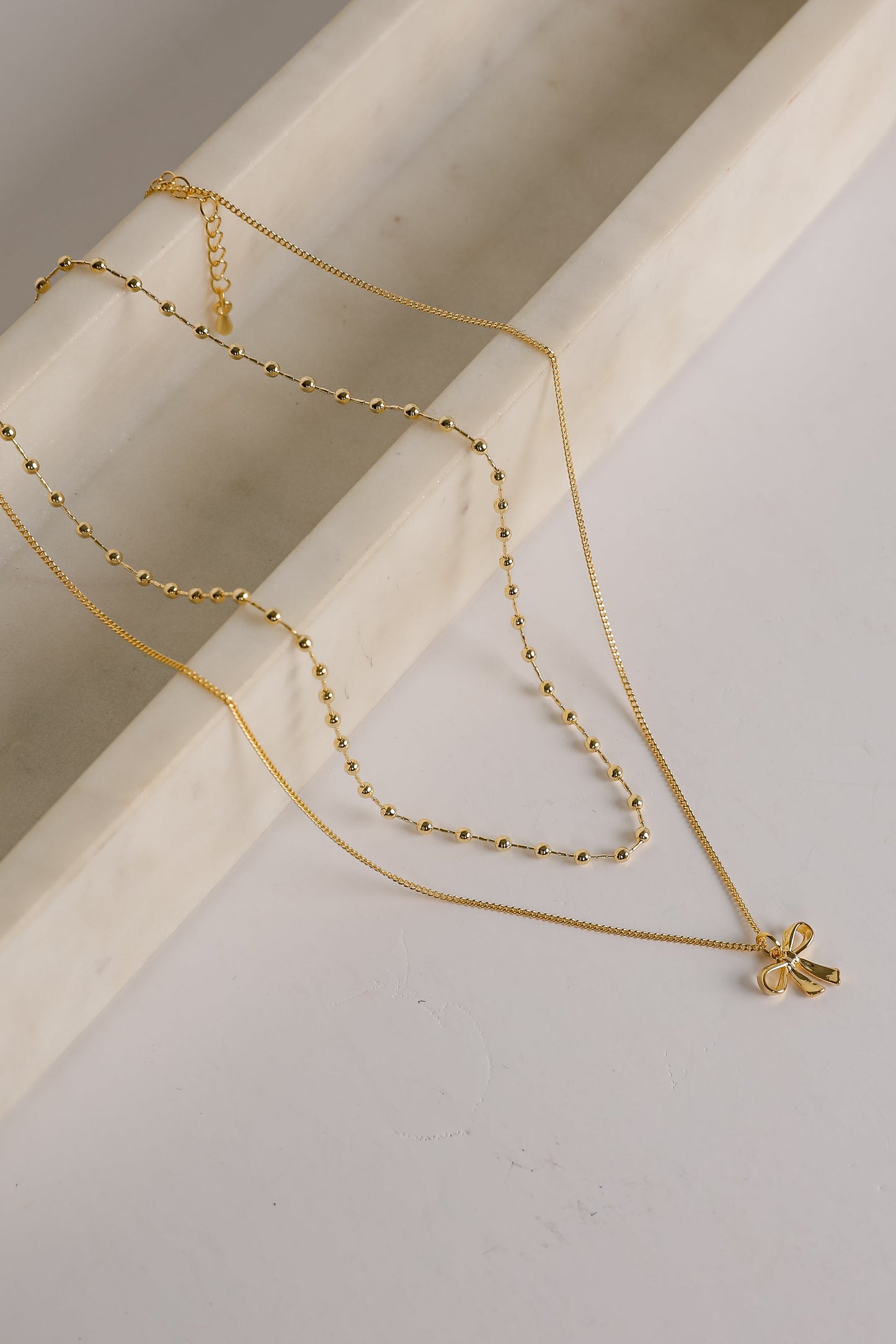 Allie Gold Layered Bow Charm Necklace