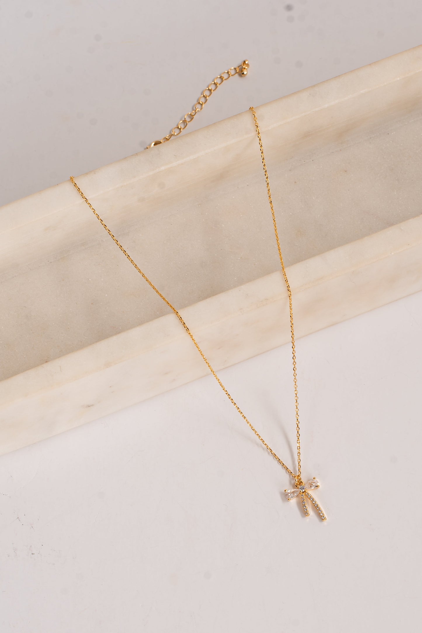 Charlie Gold Rhinestone Bow Charm Necklace