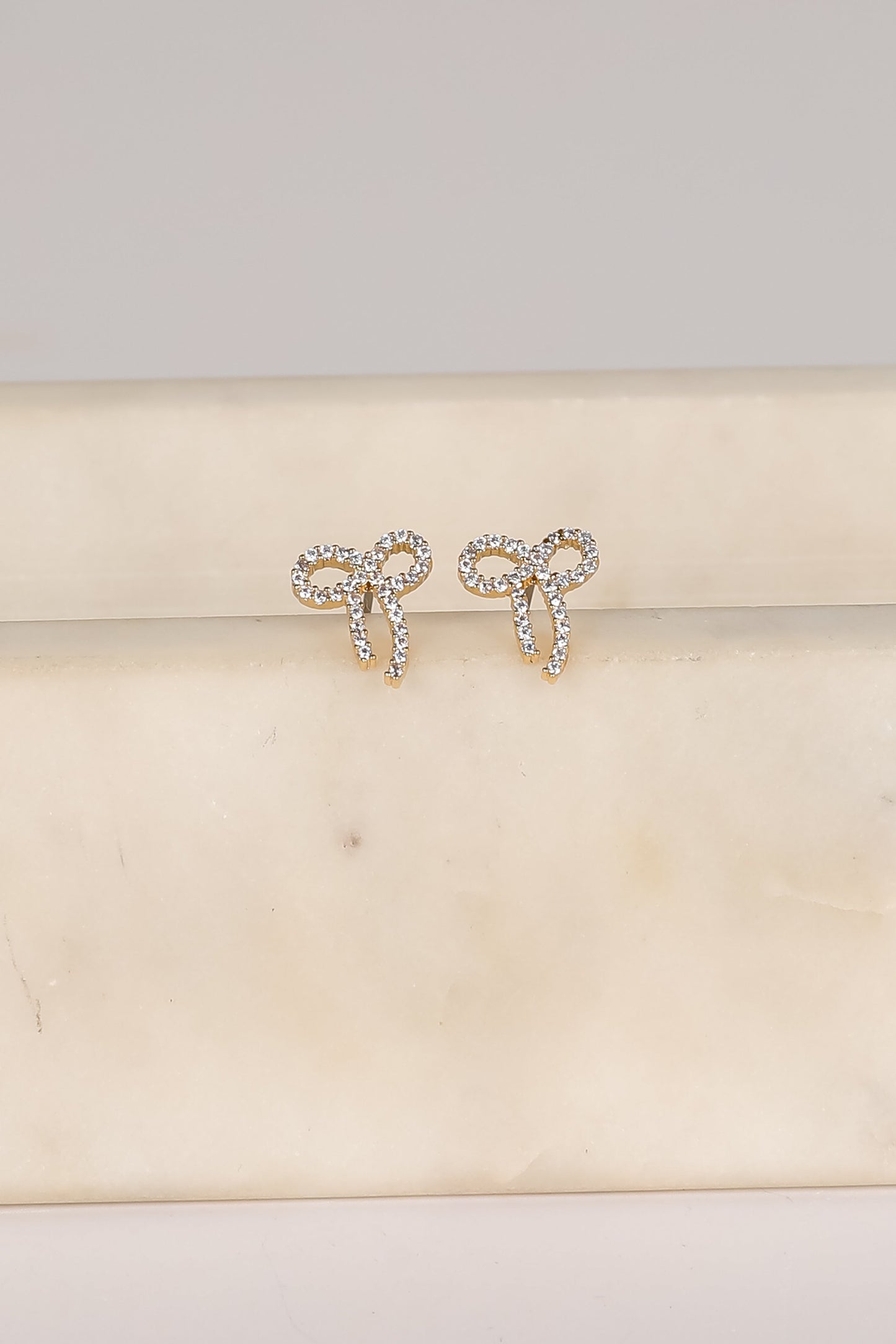 Daniella Gold Rhinestone Bow Earrings