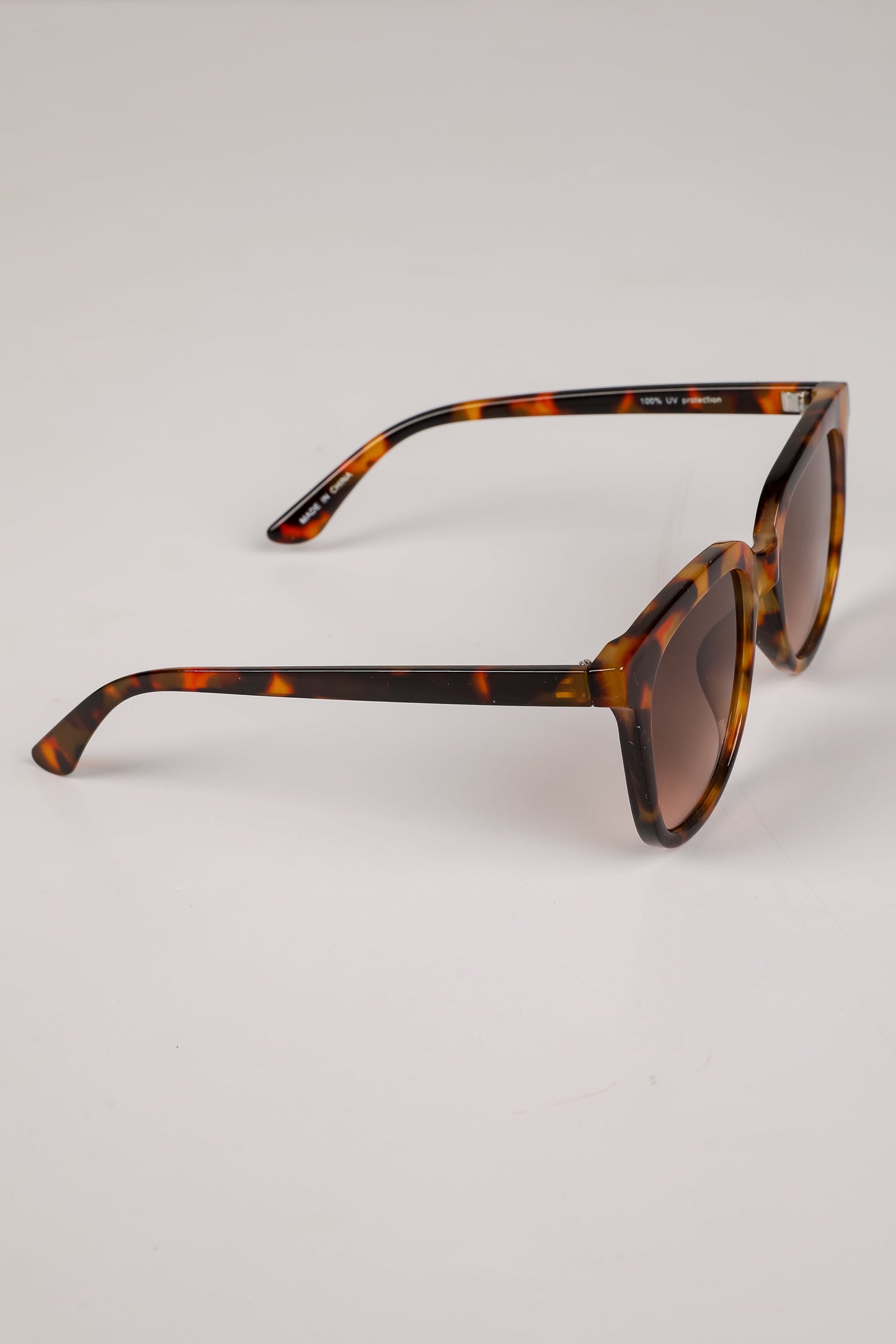 Glistening Lights Tortoise Round Sunglasses