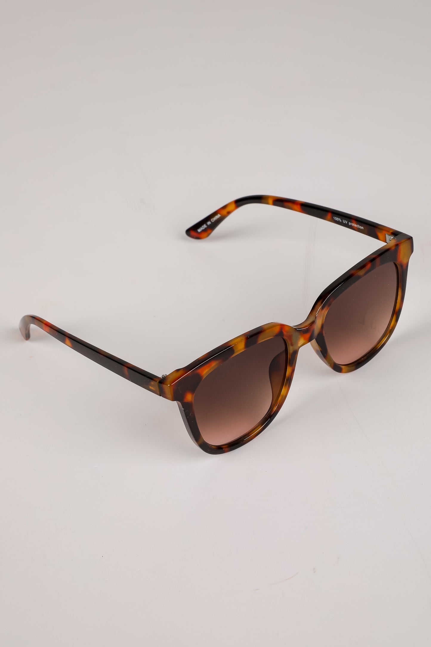 Glistening Lights Tortoise Round Sunglasses
