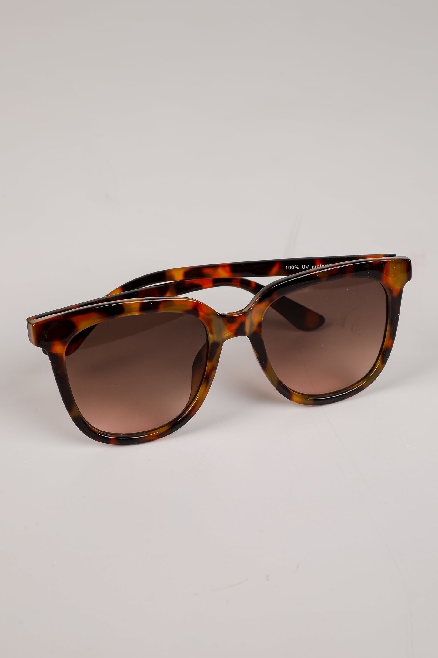 Glistening Lights Tortoise Round Sunglasses